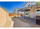 Large backyard with gravel, covered patio, and grill at 1004 Huckburn Ave, Henderson, NV 89015