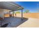 Covered patio with pavers and built-in grill at 1004 Huckburn Ave, Henderson, NV 89015