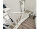 Staircase with white railing leading to the second floor at 1004 Huckburn Ave, Henderson, NV 89015