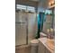 Clean bathroom with shower and updated vanity at 10452 Acclamato Ave, Las Vegas, NV 89135