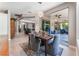 Casual dining area with sliding glass doors leading to the backyard at 10452 Acclamato Ave, Las Vegas, NV 89135