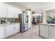 Bright kitchen featuring stainless steel appliances and granite countertops at 10452 Acclamato Ave, Las Vegas, NV 89135