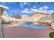 Beautiful kidney shaped pool with plenty of patio space at 1144 Sage Valley Ct, Las Vegas, NV 89110