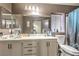 Bathroom with double vanity and shower/tub combo at 1144 Sage Valley Ct, Las Vegas, NV 89110