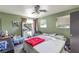 Bright bedroom with a queen-size bed and vanity at 1144 Sage Valley Ct, Las Vegas, NV 89110