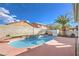 Stunning kidney shaped pool and spacious patio great for entertaining at 1144 Sage Valley Ct, Las Vegas, NV 89110