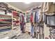 Large walk-in closet with ample shelving and hanging space at 1144 Sage Valley Ct, Las Vegas, NV 89110