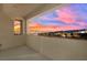 Balcony offering breathtaking sunset and city views at 12073 Glentana View St, Las Vegas, NV 89138