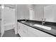 Bathroom with double vanity and dark countertop at 12073 Glentana View St, Las Vegas, NV 89138