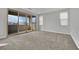 Spacious bedroom with sliding doors leading to a balcony at 12073 Glentana View St, Las Vegas, NV 89138