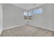 Simple bedroom with neutral walls and carpet flooring at 12073 Glentana View St, Las Vegas, NV 89138