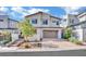 Two story home with modern facade and landscaping at 12073 Glentana View St, Las Vegas, NV 89138