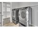 Modern laundry room with washer and dryer, and extra storage at 12073 Glentana View St, Las Vegas, NV 89138