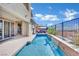 Relaxing pool with a waterfall feature and spacious patio at 12073 Glentana View St, Las Vegas, NV 89138