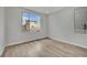 Bright spare bedroom with light gray walls and wood floors at 12073 Glentana View St, Las Vegas, NV 89138