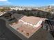 Single-story house with desert landscaping, driveway, and solar panels; nice view of the city at 1226 Sunfire St, Henderson, NV 89014