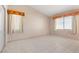 Spacious bedroom with tile floors and dual windows at 1226 Sunfire St, Henderson, NV 89014