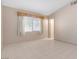 Bright bedroom with tile flooring and window coverings at 1226 Sunfire St, Henderson, NV 89014