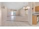 Bright living room with tile flooring and access to the backyard at 1226 Sunfire St, Henderson, NV 89014