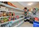 Spacious pantry with abundant shelving for optimal storage and organization capabilities at 12898 Slipknot St, Las Vegas, NV 89141