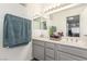 Double vanity bathroom with a large mirror at 1375 E Hacienda Ave # 201, Las Vegas, NV 89119