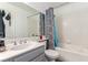 Bathroom with tub, toilet, and double sink vanity at 1375 E Hacienda Ave # 201, Las Vegas, NV 89119