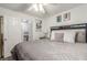 Comfortable bedroom with a king-size bed and access to laundry at 1375 E Hacienda Ave # 201, Las Vegas, NV 89119