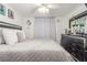 Spacious bedroom with a king-size bed and large dresser at 1375 E Hacienda Ave # 201, Las Vegas, NV 89119