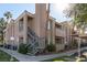 Exterior view of building showing stairs and landscaping at 1375 E Hacienda Ave # 201, Las Vegas, NV 89119