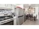 Kitchen with gray cabinets and stainless steel appliances at 1375 E Hacienda Ave # 201, Las Vegas, NV 89119