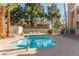 Inviting kidney-shaped community pool with lounge chairs at 1375 E Hacienda Ave # 201, Las Vegas, NV 89119