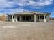 Single-story house with a covered patio at 1400 Equestrian Ct, Pahrump, NV 89048