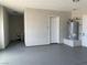 Unfinished garage with grey flooring and extra storage space at 1400 Equestrian Ct, Pahrump, NV 89048