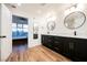 Modern bathroom with double vanity, walk-in shower, and city view at 150 Las Vegas Blvd # 1909, Las Vegas, NV 89101