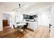 Modern dining area with marble table and black chairs near kitchen at 150 Las Vegas Blvd # 1909, Las Vegas, NV 89101