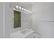 Modern bathroom with updated vanity, large mirror, and shower at 1613 Iron Ridge Dr, Las Vegas, NV 89117