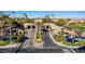 Gated entrance to a luxury community with water features and palm trees at 1613 Iron Ridge Dr, Las Vegas, NV 89117