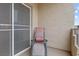 Private balcony with comfortable lounge chair and screen at 1851 Hillpointe Rd # 2123, Henderson, NV 89074