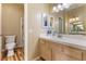 Bathroom with double vanity, updated fixtures, and a shower/tub at 1851 Hillpointe Rd # 2123, Henderson, NV 89074