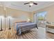 Main bedroom with a king-size bed and sliding glass door to balcony at 1851 Hillpointe Rd # 2123, Henderson, NV 89074