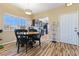 Dining area with table and chairs, open to kitchen at 1851 Hillpointe Rd # 2123, Henderson, NV 89074