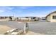 Large backyard with gravel, sheds, and solar panels at 1920 Cavalry St, Pahrump, NV 89048