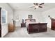 Serene bedroom with wood furniture and large windows at 1920 Cavalry St, Pahrump, NV 89048