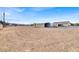 Large lot with a home and several outbuildings in view at 1920 Cavalry St, Pahrump, NV 89048