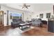 Living room featuring hardwood floors, two couches and a coffee table at 1920 Cavalry St, Pahrump, NV 89048