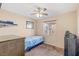 Bedroom with ceiling fan, window, and carpet at 2000 Golden Shadow Ct, Henderson, NV 89002