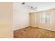 Spacious bedroom with ceiling fan and carpet at 2000 Golden Shadow Ct, Henderson, NV 89002