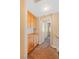 Upper hallway with wood cabinets and carpet at 2000 Golden Shadow Ct, Henderson, NV 89002