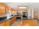 Bright kitchen with stainless steel appliances and granite countertops at 2000 Golden Shadow Ct, Henderson, NV 89002