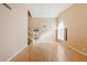 Bright living room with hardwood floors and staircase at 2000 Golden Shadow Ct, Henderson, NV 89002